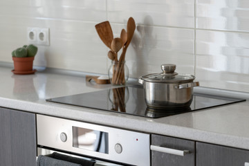 Kitchen with built in ceramic induction stove