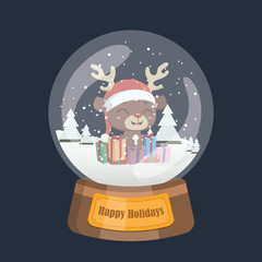 Christmas snowglobe with cute reindeer and presents inside © agnessz