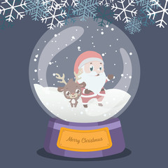 Christmas snowglobe with cute reindeer and Santa inside