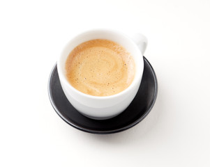 Cup of coffee isolated on white background. Close up. Copy space.