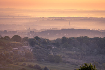 town in a misty valley