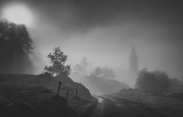 Village in the morning mist