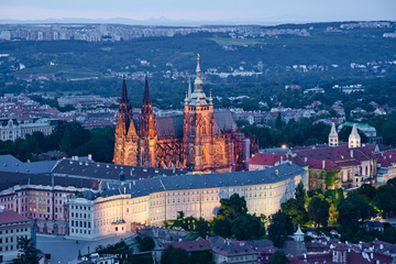 Aerial view of the city. St. Vitus Cathedral in the evening. Prague, Czech Republic