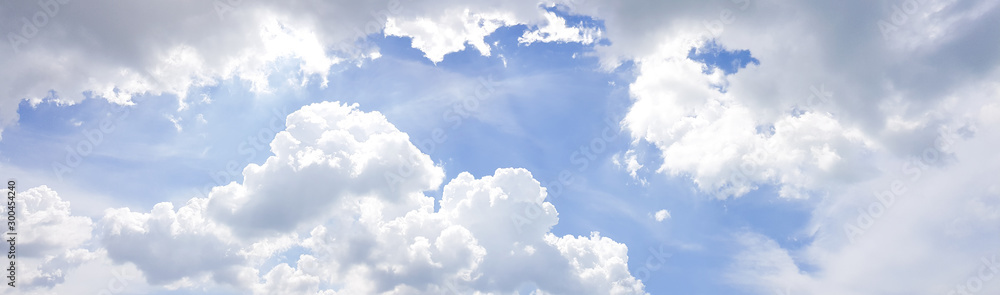 Wall mural panorama of clear blue sky with white cloud background. clearing day and good weather in the morning