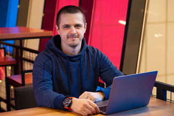 Freelance developer or designer looking in camera
