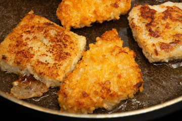 fish with egg and potatoes in the tray