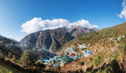 Namche Bazaar from Everest Base Camp (EBC) trekking route and snowy Kongde Ri Mountain 6187m on the background. Sagarmatha National Park, Nepal.