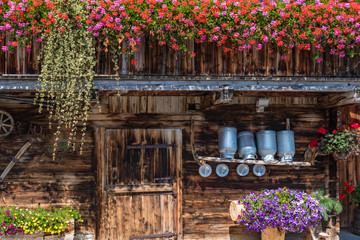 flowers at the wooden farmhouse