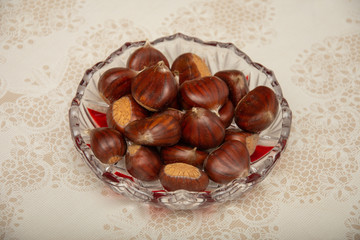A small pile of chestnuts, conkers isolated 