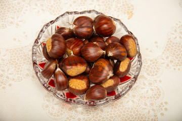 A small pile of chestnuts, conkers isolated 