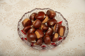 A small pile of chestnuts, conkers isolated 