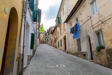 Fototapeta na wymiar Street of the ancient city of Siena, Italy
