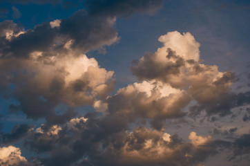Naklejka na ściany i meble Storm clouds at sunset
