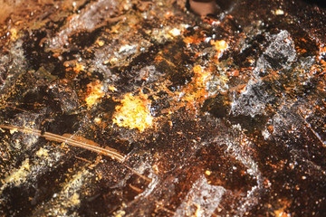 Closeup of dirty grill metal plate - can be used as grunge texture