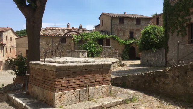 Small medieval village in 4K. Cisterna square, Rocca D Orcia, Siena, Tuscany Italy