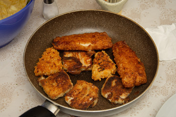 fish with egg and potatoes in the tray