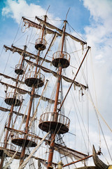 mast of an ancient sailing pirate ship closeup