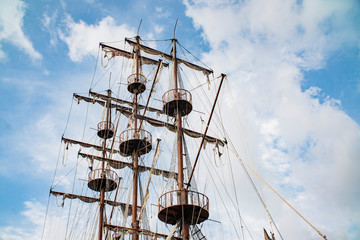 mast of an ancient sailing pirate ship closeup