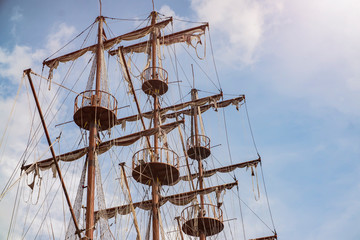 mast of an ancient sailing pirate ship closeup