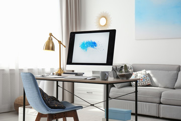 Comfortable workplace with modern computer on desk. Home office