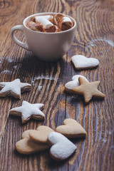 Hot chocolate, cocoa with marshmallows, Christmas cookies on festive table