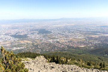 Fototapeta premium Panorama of city of Sofia from Kamen Del Peak, Bulgaria