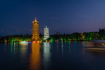 Sun and Moon Pagodas Towers at night