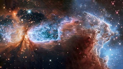 Foto op Canvas Ergens in extreem diepe ruimte verre sterrenstelsels en sterrenstof. Science fiction achtergrond. Elementen van deze afbeelding zijn geleverd door NASA. © ALEXANDR YURTCHENKO