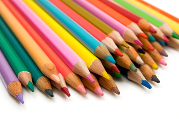 Tip of Colored Crayons on White Background