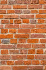 Naklejka premium Bright textured red brick wall