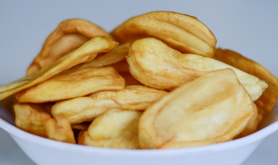 Jackfruit chips on white background.