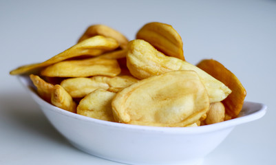 Jackfruit chips on white background.
