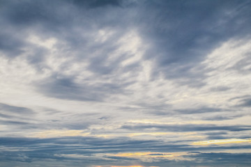Fototapeta premium light blue clouds. low evening overcast. weather change The dark sky and the dark clouds moved instead of clear skies and white clouds when the rain was approaching.