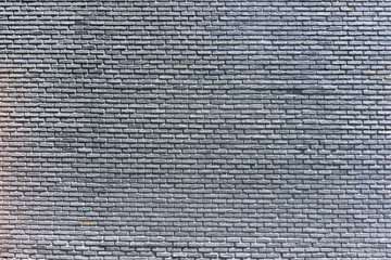 Gray brick wall background for design, background and texture.