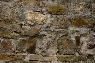 Background, texture, old masonry of the old fortress.