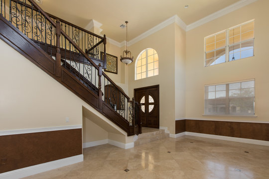 Vacant luxury interior home with staircase