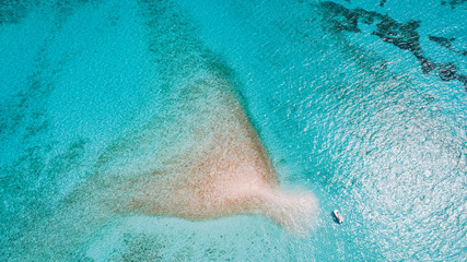 boat anchored Private Mermaid tail shaped Island in Florida Keys