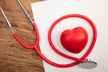 Red Stethoscope with Toy Heart