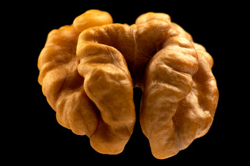 walnut closeup on a black background