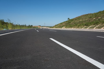 Brand new asphalt road horizon cloudless perspective landscape