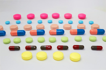 variety of kinds of drugs in lines in Medical healthcare manufacturing factory concept with copy space
