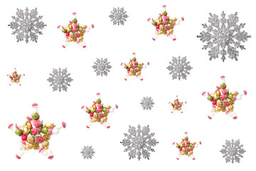 Christmas pattern. decorations in the form of stars and snowflakes. new year decor in the form of berries, cones, mushrooms and acorns on a white background. the view from the top, flat layout