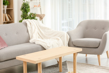 Comfortable furniture in interior of room