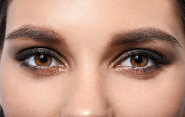Fototapeta premium Young woman with beautiful eyebrows, closeup