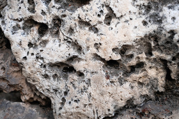 Background of mountain stones. The surface of the stones. Rock texture