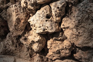 Background of mountain stones. The surface of the stones. Rock texture