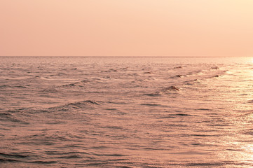 Obraz premium Beautiful background sunset over the sea at evening.