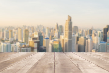 Display old wood bridge shelves with beautiful blurred city scape background for displaying various beautiful products.