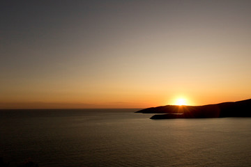Colorful ocean sunset with the setting sun. Seascape at sunset.