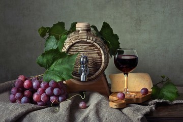 Still life with grapes and red wine © Iryna